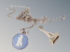 A silver pendant and chain