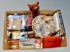 A box of vintage and later games, plastic animal figures,