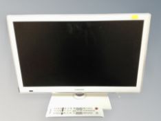 A Samsung 22 inch LCD Smart TV with remote