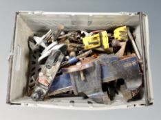 A box of assorted hand tools, woodworking planes,