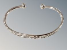 A silver torque bangle