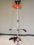 A Pro Gen tools petrol strimmer with harness