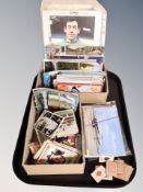 A tray of postcards, miniature playing cards,