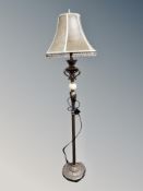 A contemporary onyx and resin standard lamp