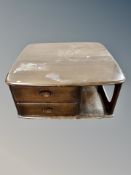 An Ercol stained elm Pandora's Box coffee table