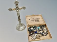 A free standing crucifix together with plantage cigar box containing numerous crosses and prayer