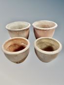 Four terracotta garden plant pots