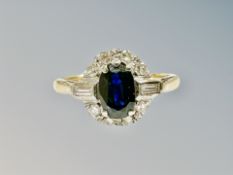 An 18ct gold sapphire and diamond cluster ring,