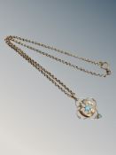 A rose gold turquoise pendant on belcher chain CONDITION REPORT: 5.