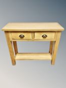 A Oak Furniture Land contemporary oak two drawer side table,