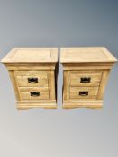 A pair of Oak Furniture Land contemporary oak two drawer bedside stands,