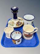 A ceramic Pusser's rum decanter (empty), together with a Sunderland Draught bitter lustre mug,