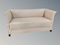 A Danish salon settee in oatmeal fabric