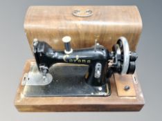 A Corona sewing machine in box