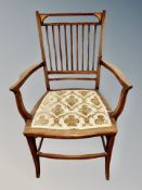 An Edwardian inlaid mahogany armchair