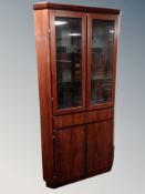 A Danish rosewood effect corner cabinet