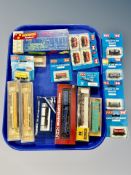 A group of mainly N scale die cast locomotive and rolling stock including Tomix etc