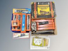 A Hornby Railways Treasure Chest box containing boxed 00 gauge carriages, track, control unit,