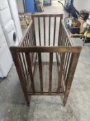 An Edwardian oak crib