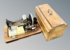 A Frister and Rossman sewing machine in case