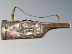 A 19th century stitched brown leather leg o' mutton shotgun case,
