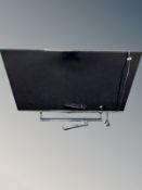 A Panasonic 39 inch LCD TV with lead and remote