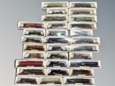 A collection of thirty die cast locomotives on plinths