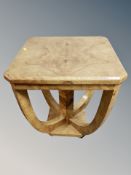 An Art Deco style figured walnut high gloss shaped occasional table width 53 cm