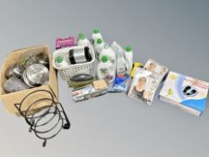 Three boxes of household items including kitchen pots and pans, laundry detergent, kitchen bags,