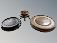 A Chinese carved rosewood vase stand, diameter 17.