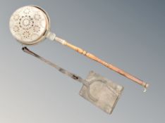 A 19th century copper bed warming pan together with a fire shovel