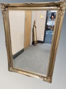 A Victorian style gilt overmantel mirror 107 cm x 76 cm