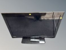 A Technika 40 inch LCD TV with lead and remote