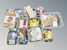 Three boxes of model railway building components