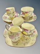 Approximately twenty one pieces of Crown Staffordshire floral decorated tea china
