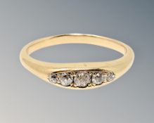 A gold five stone diamond ring, size G CONDITION REPORT: 2.7g. Marked rubbed.