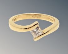 An 18ct gold princess cut solitaire diamond ring, size M CONDITION REPORT: 3.