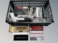 A large quantity of boxed and loose ball point pens including Parker,
