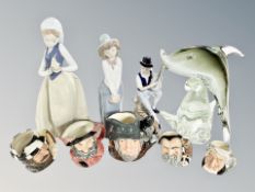 Two Nao figures, glass sculpture of a dolphin,