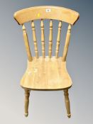 A pine spindle backed chair