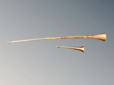 Two copper hunting horns,