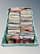 A large quantity of seven inch vinyl singles including Status Quo, Dead or Alive, Paul Young,