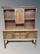 A Georgian style oak kitchen dresser,
