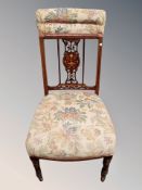 A late Victorian rosewood and satinwood inlaid chair