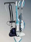 Three Vax floor cleaners and an Electrolux floor cleaner