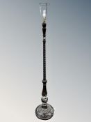 A carved barleytwist standard lamp together with a further metal figural table lamp