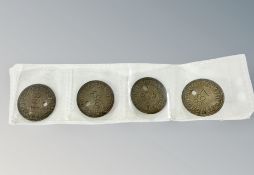 Four fantasy Tynemouth tram tokens