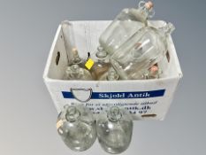 Ten glass demi johns