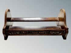 An Edwardian oak book trough carved with the mantra 'Read That Thou May'st Know',