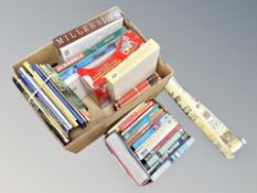 Two boxes of volumes relating to travel, games and jigsaw,